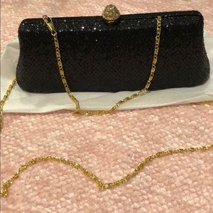 Black mini clutch never worn before